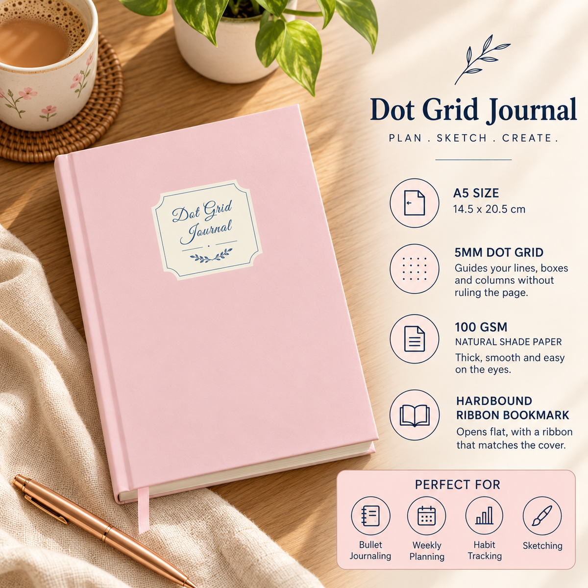 Blush Pink dot grid journal on a desk