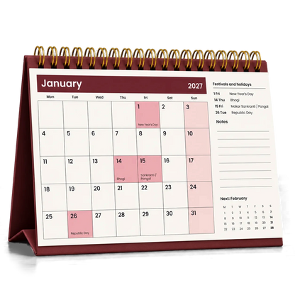 2027 desk calendar in Maroon, open at January with festivals and holidays listed beside the dates