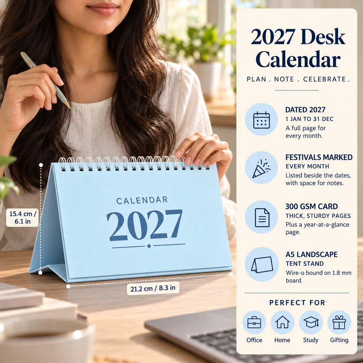 2027 desk calendar in Powder Blue on a desk with a woman's hand on it, with size and key features