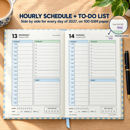 2027 daily planner diary in Powder Blue Check, open flat at the dated day pages with hourly schedule and to-do list