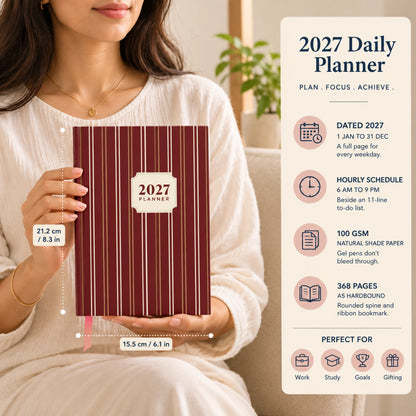 2027 daily planner diary in Red Stripe, held by a woman, with size and key features